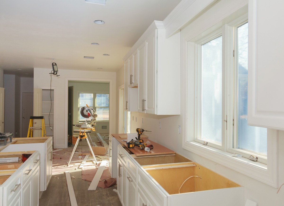 Home Renovation: Custom kitchen cabinets of installation base of kitchen cabinets.