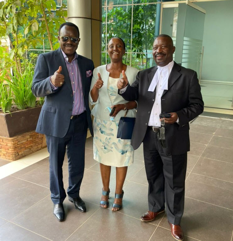 An elated Ben Kavuya (L) and his lawyer Hon. Mwesigwa Rukutana at the Court of Appeal on Friday. 