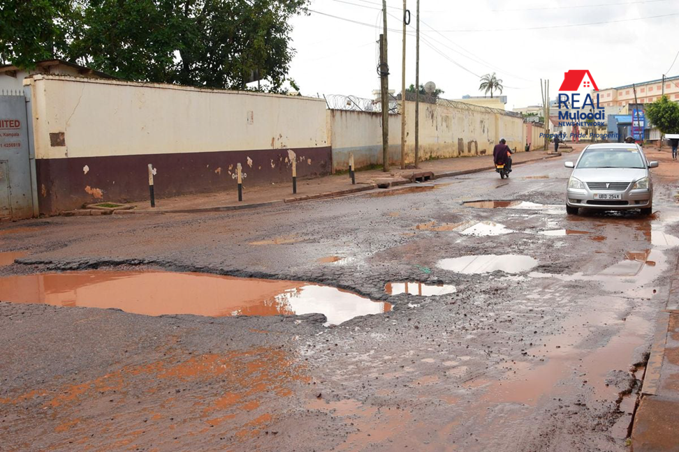 Kampala City roads with potholes, which the KCCA aims to tackle beginning in February.