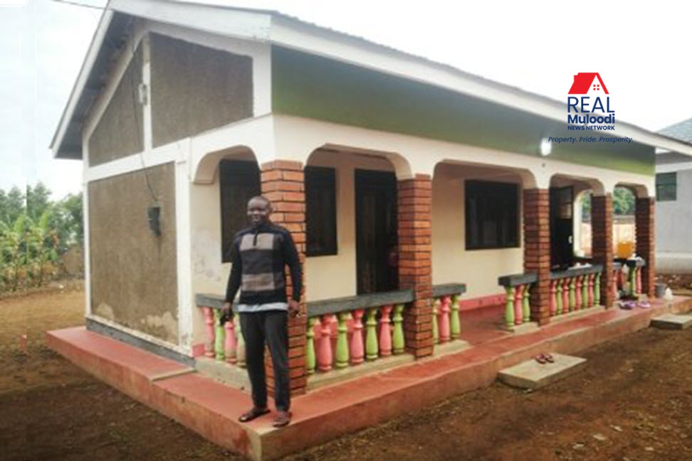 Jurua standing by his house which Minister Oleru's husband was allegedly renting for more than 3 years.